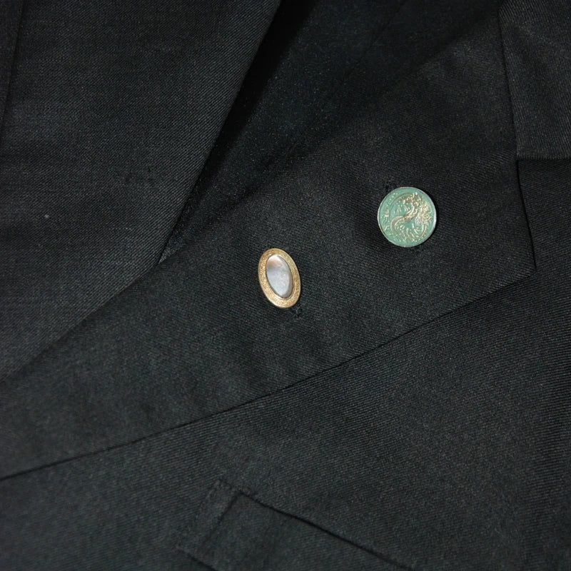 untitled 109 - black blazer with vintage jewels